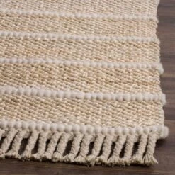 Nita Solid Woven Rug - Safavieh
