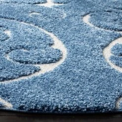 2'3"x11' Runner Swirl Loomed Rug Light Blue/Cream - Safavieh -Safavieh GUEST a3326333 45ad 46a7 b16a cc96806123dc