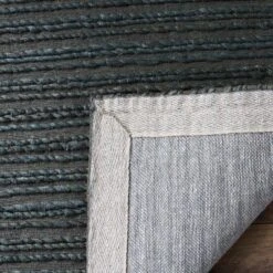 Melinda Solid Woven Area Rug - Safavieh -Safavieh GUEST c9d10b12 25a0 4e45 ae4a 236944898dd0